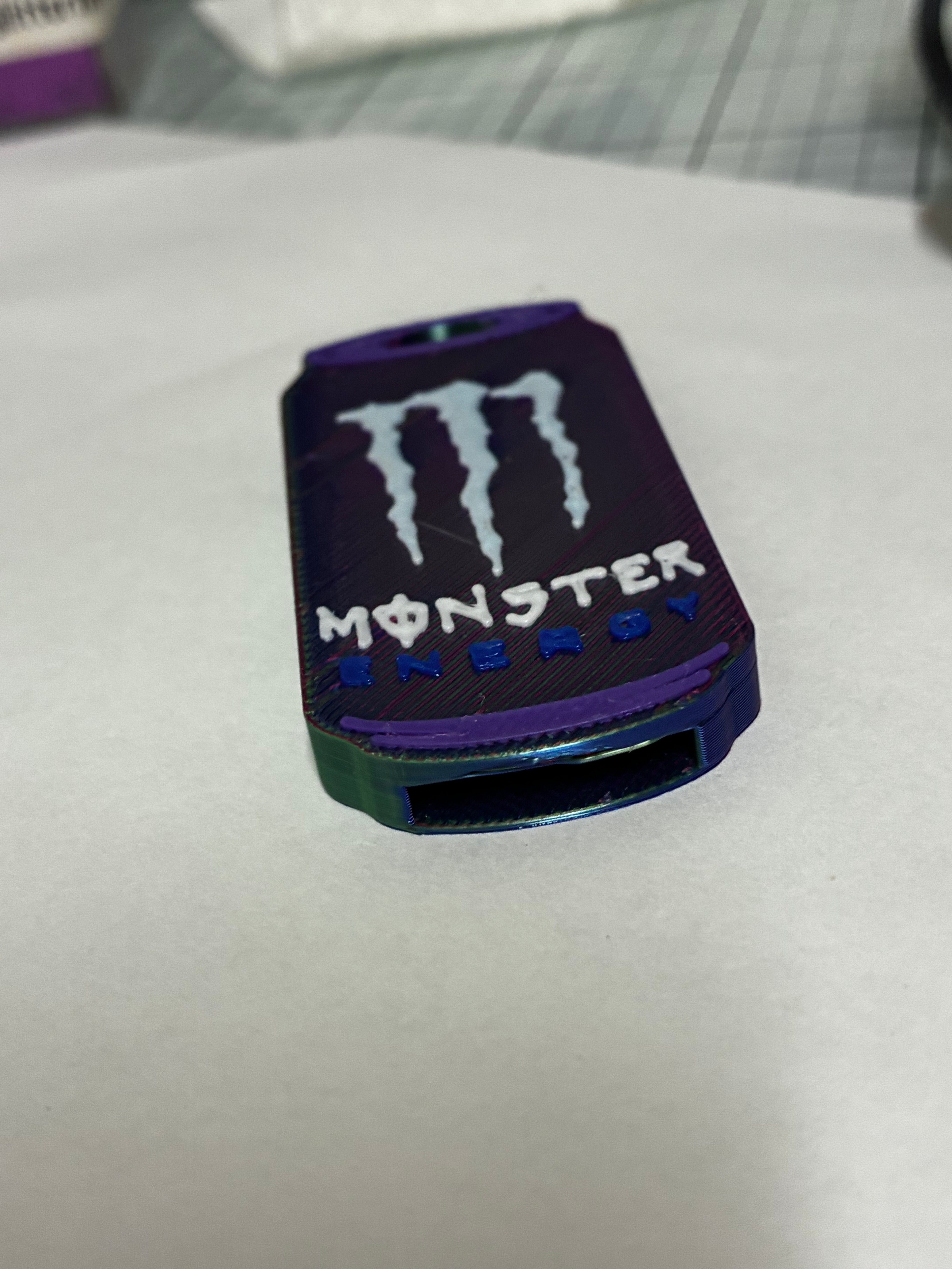 monster can opener keychain